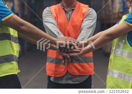 Diversity Teamwork hands stack together trust partner. Warehouse worker fist bump Engineer man, women hands holding partnership. Multiracial people fist bump partner colleague logistics Warehouse Diversity Teamwork hands stack together trust partner. Warehouse worker fist bump Engineer man, women hands holding partnership. Multiracial people fist bump partner colleague logistics Warehouse 122352652