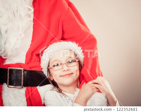 Santa claus with little girl. Santa claus with little girl. 122352681