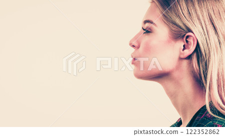 Woman sending air kiss Woman sending air kiss 122352862