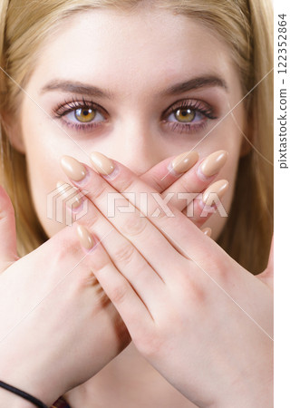 Woman being silent 122352864