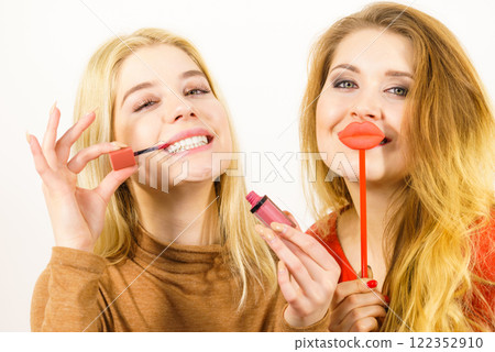 Two women and lip product 122352910