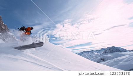 Freeze Motion of Jumping Snowboarder in Fresh Powder Snow. Austria Alps, Europe. 122353178