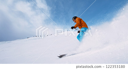 Freeze Motion of Running Skier on Ski Slope. Austria Alps, Europe. 122353180