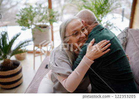 Elderly couple hugging, enjoying each other company. Senior love. 122353205