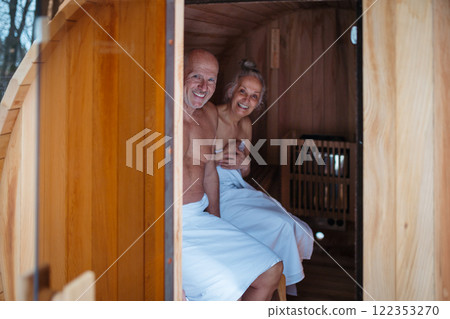 A spa sauna session for elderly man and woman. Romantic spa moment for seniors. A spa sauna session for elderly man and woman. Romantic spa moment for seniors. 122353270