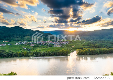 Panorama of Wachau valley with Danube river near Duernstein village in Lower Austria. Traditional wine and tourism region, Danube cruises. Panorama of Wachau valley with Danube river near Duernstein village in Lower Austria. Traditional wine and tourism region, Danube cruises. 122354409