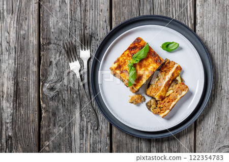 Moussaka, greek beef and eggplant dish, top view Moussaka, greek beef and eggplant dish, top view 122354783