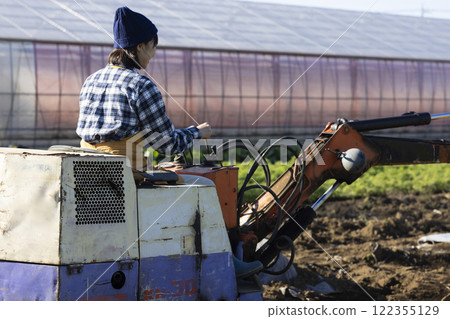 Scene of a woman working in the fields Scene of a woman working in the fields 122355129