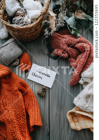 Styled flat lay of knitwear promoting second hand and zero waste 122355695