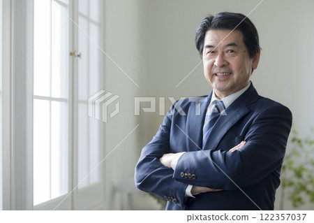 A serious looking businessman A serious looking businessman 122357037