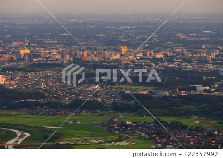 Tsukuba city at dusk as seen from Mount Hokyo 122357997