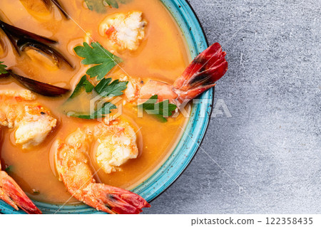 French seafood bouillabaisse soup with shrimps and mussels photography . Top view French seafood bouillabaisse soup with shrimps and mussels photography . Top view 122358435