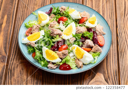 Canned Tuna salad with eggs and tomatoes photography . Top view Canned Tuna salad with eggs and tomatoes photography . Top view 122358477
