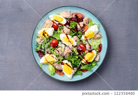 Canned Tuna salad with eggs and tomatoes photography . Top view Canned Tuna salad with eggs and tomatoes photography . Top view 122358480