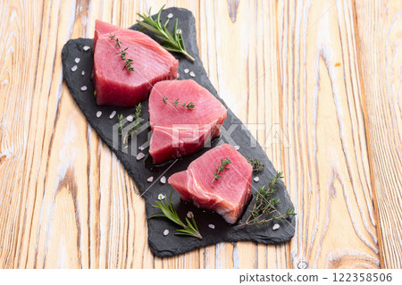Raw tuna steak ( fillet ) photography . Top view 122358506