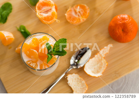 Seasonal citrus dessert with mint 122358789