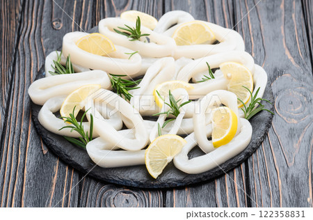 Squid tube and ring photography . Seafood top view 122358831