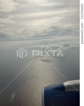 Aerial photo of the sea with sunlight shining on it Aerial photo of the sea with sunlight shining on it 122359281