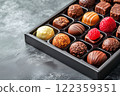 Chocolates in a gift box with copy space 122359351