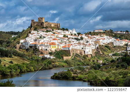 View of the river Guadiana and the village of Mertola. Alentejo Region. Portugal View of the river Guadiana and the village of Mertola. Alentejo Region. Portugal 122359847