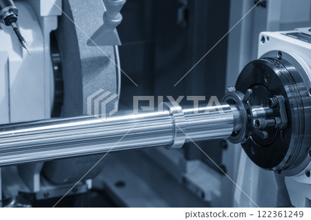 The cylindrical grinding machine in the light blue scene. 122361249