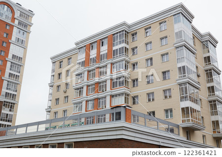 Modern high-rise multi-storey residential building with balconies Modern high-rise multi-storey residential building with balconies 122361421