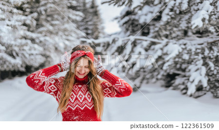 Happy Smiling Woman in Snowy Winter Forest Happy Smiling Woman in Snowy Winter Forest 122361509