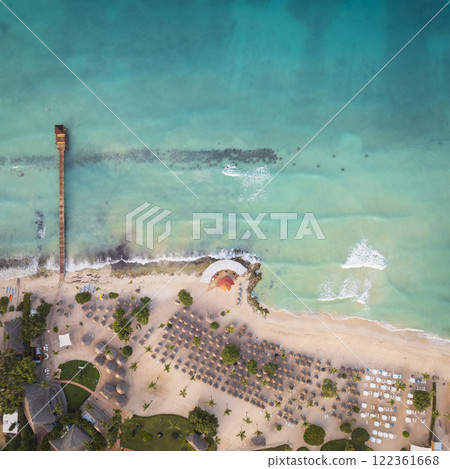Birds eye view of a Bayahibe beach with palms and lighthouse 122361668