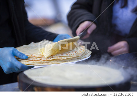 Street food. Fried pancakes in a street cafe. Street food. Fried pancakes in a street cafe. 122362105