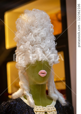 Extravagant creative female mannequin with a strange hairstyle in baroque style. 122362106