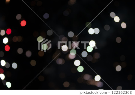 On a black background bokeh from explosions of colorful fireworks. On a black background bokeh from explosions of colorful fireworks. 122362368