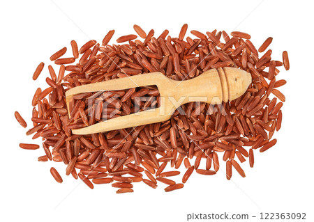 red rice in a wooden scoop isolated on white background. Top view. Flat lay 122363092