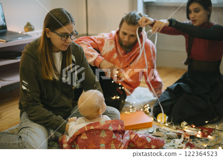 Experience Creative and Joyful Family Moments with Your Baby and Beautiful Twinkling Lights 122364523