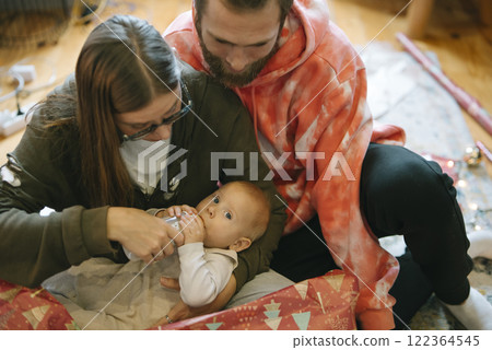 Sharing a Heartwarming Family Bonding Moment with Our Baby During Holiday Celebration Sharing a Heartwarming Family Bonding Moment with Our Baby During Holiday Celebration 122364545