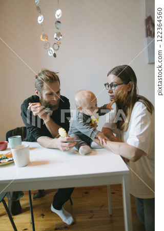 Enjoying heartwarming family bonding experiences through joyful and playful activities at home 122364560