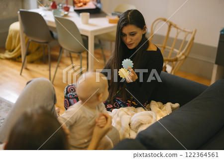 An Engaging Family Moment of Quality Time with the Baby and Colorful Toys and Games 122364561