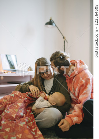 Experience beautiful and cozy family moments with your baby in a lovely modern living room 122364608