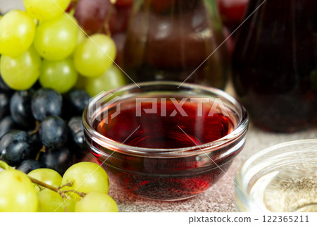 Natural Organic Wine Vinegar Among Grapes 122365211