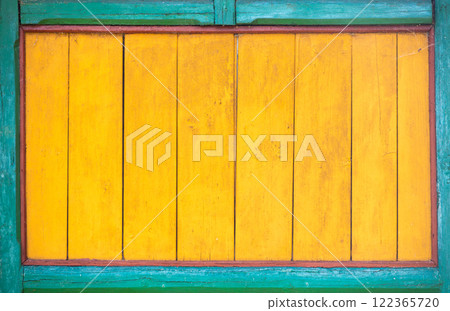 Yellow and blue painted wood - wooden background, empty frame for designs Yellow and blue painted wood - wooden background, empty frame for designs 122365720