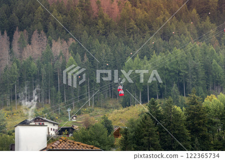 Ortisei, Italy street, Mont Seuc cable car cabins Ortisei, Italy street, Mont Seuc cable car cabins 122365734