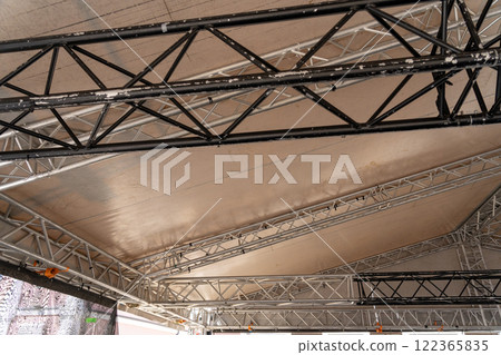Elements of a prefabricated modular roof structure for a mobile concert stage. 122365835