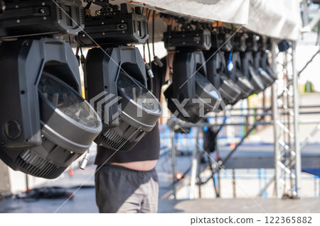 Installation of lighting equipment on a mobile concert stage. Installation of lighting equipment on a mobile concert stage. 122365882