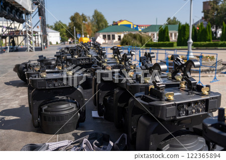 Concert lighting equipment awaits installation on stage Concert lighting equipment awaits installation on stage 122365894