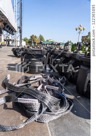 Concert lighting equipment awaits installation on stage 122365895