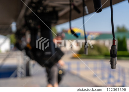 Installation of lighting equipment on a mobile concert stage. 122365896