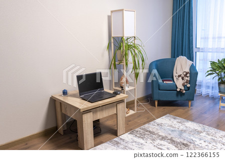 Close up of the cozy corner in the apartment with comfortable arm chair. 122366155