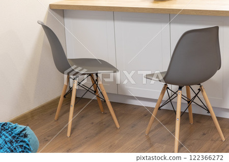 Ergonomic, modern, stylish chairs at the modern apartment Ergonomic, modern, stylish chairs at the modern apartment 122366272