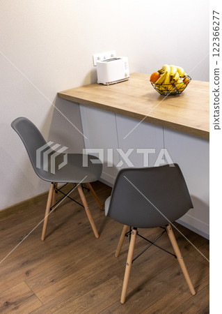 Ergonomic, modern, stylish chairs at the modern apartment Ergonomic, modern, stylish chairs at the modern apartment 122366277