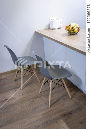 Ergonomic, modern, stylish chairs at the modern apartment Ergonomic, modern, stylish chairs at the modern apartment 122366278