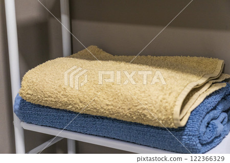 Shelf above the washing machine with household items Shelf above the washing machine with household items 122366329